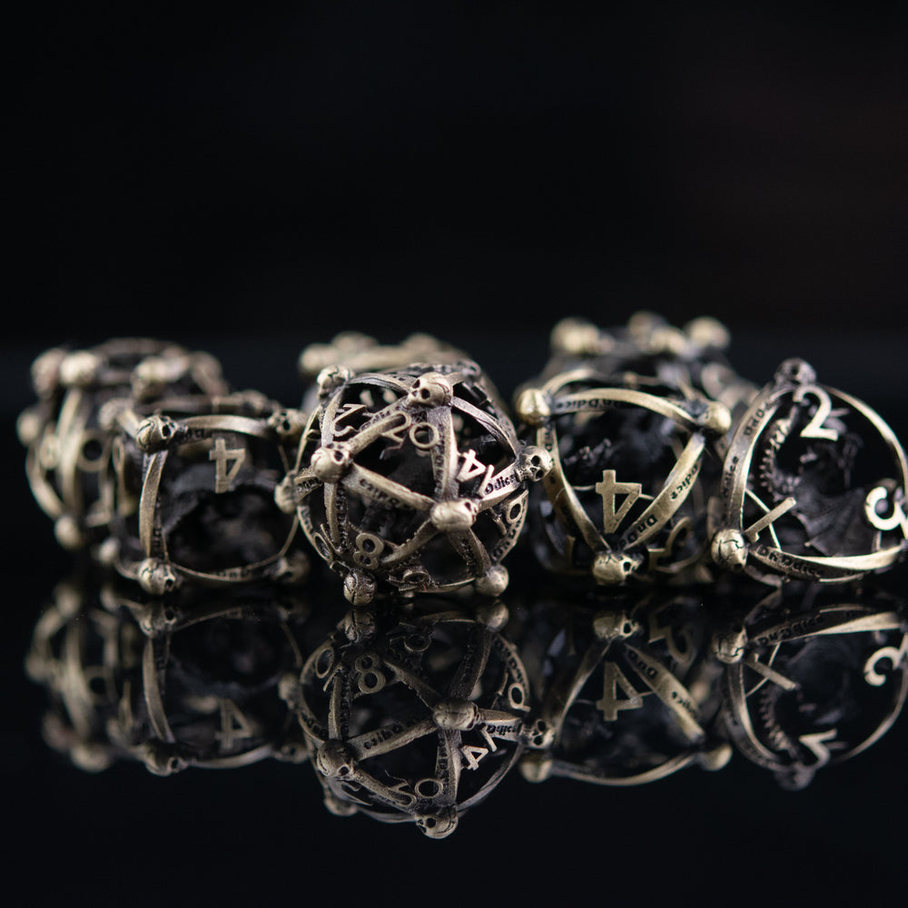 Draco Immortui Hollow Metal Dice Set - Champagne Gold (ONLINE ORDER ONLY)