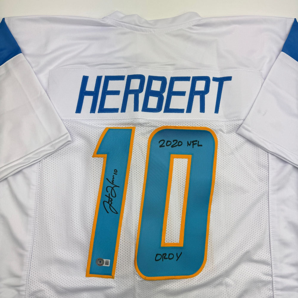 Autographed/Signed Justin Herbert 2020 ROY Los Angeles San Diego White Football Jersey Beckett BAS COA (ONLINE ORDER ONLY)