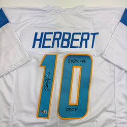 Autographed/Signed Justin Herbert 2020 ROY Los Angeles San Diego White Football Jersey Beckett BAS COA (ONLINE ORDER ONLY)