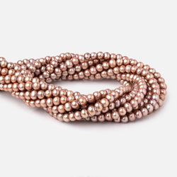 6x5-7x5mm Rose Champagne Off Round Large Hole Freshwater Pearl 15 inch 75 pieces (ONLINE ORDER ONLY)