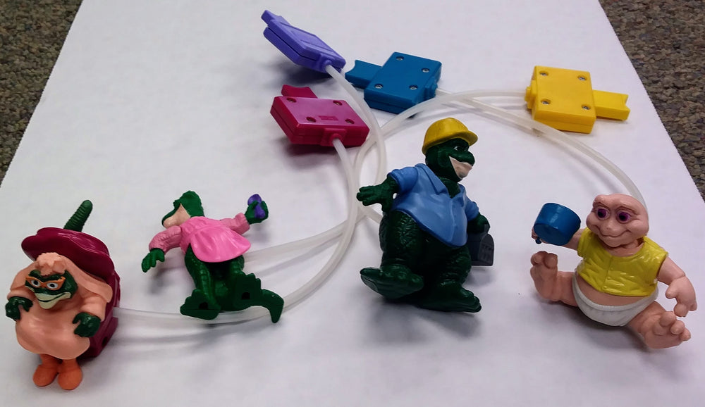 McDonald's Happy Meal toy set - Dinosaurs pump action figures (ONLINE ORDER ONLY)