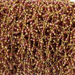 2mm Garnet microfaceted round Gold plated Dangling Chain by the foot (ONLINE ORDER ONLY)