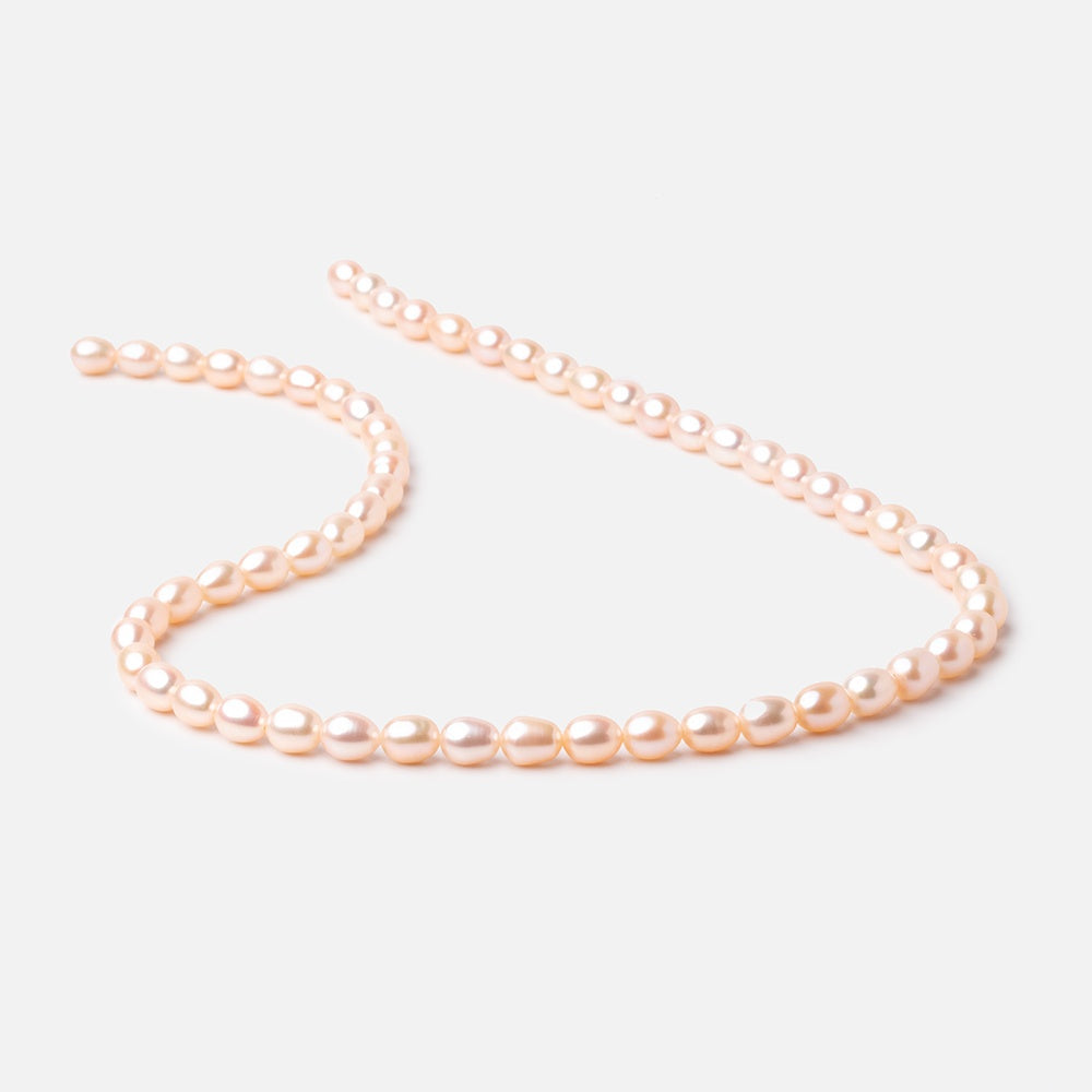 7x5mm Peach Straight Drill Oval Freshwater Pearl 15 inch 56 pcs