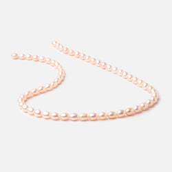 7x5mm Peach Straight Drill Oval Freshwater Pearl 15 inch 56 pcs