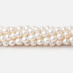 5.5mm Creamy White Ringed Baroque Freshwater Pearls 15 inch 68 Beads
