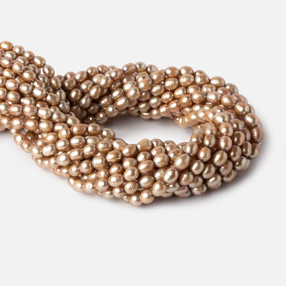 6-7mm Buttery Golden straight drilled oval pearls 15.5 inch 60 pieces (ONLINE ORDER ONLY)