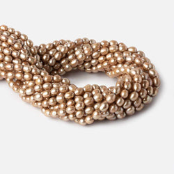 6-7mm Buttery Golden straight drilled oval pearls 15.5 inch 60 pieces (ONLINE ORDER ONLY)