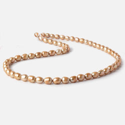 6-7mm Buttery Golden straight drilled oval pearls 15.5 inch 60 pieces (ONLINE ORDER ONLY)