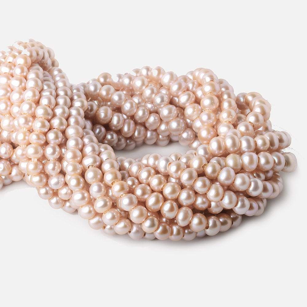 6-7mm Pink Ice Large Hole Off Round Freshwater Pearl 2.5mm drill hole, 15 inch, 75 pieces (ONLINE ORDER ONLY)