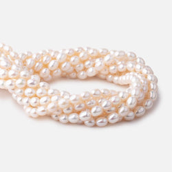 6x5mm Cream Straight Drill Oval Freshwater Pearls 15.5 inch 54 pieces AA (ONLINE ORDER ONLY)