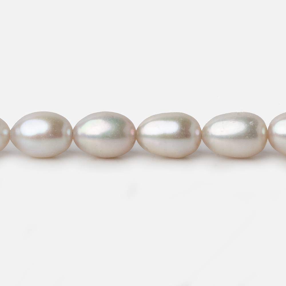 7x9-7x10mm Silver Champagne Straight Drill Oval Freshwater Pearl 16 inch 40 pieces A (ONLINE ORDER ONLY)