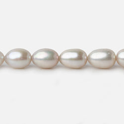 7x9-7x10mm Silver Champagne Straight Drill Oval Freshwater Pearl 16 inch 40 pieces A (ONLINE ORDER ONLY)