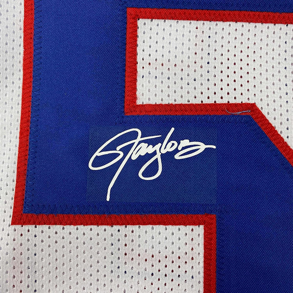 Framed Facsimile Autographed Lawrence Taylor 35x39 New York White Reprint Laser Auto Football Jersey (ONLINE ORDER ONLY)