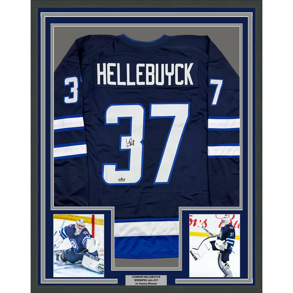 Framed Facsimile Autographed Connor Hellebuyck 35x39 Winnipeg Blue Reprint Laser Auto Hockey Jersey (ONLINE ORDER ONLY)