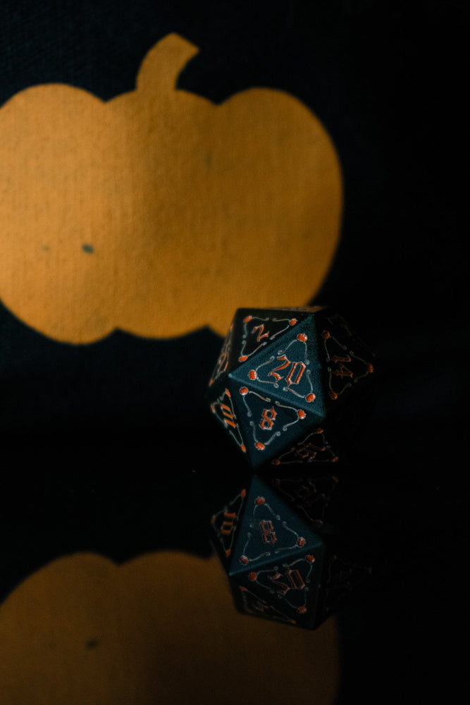 The Pumpkin Aluminum Metal Dice Set (ONLINE ORDER ONLY)