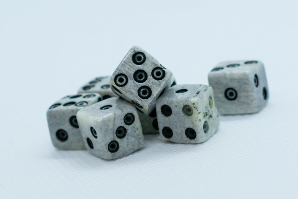 Cattle Bone Dice 10mm (Deep Eye & Ring) | Off-White Dark d6 (sold by the piece) (Online Only)