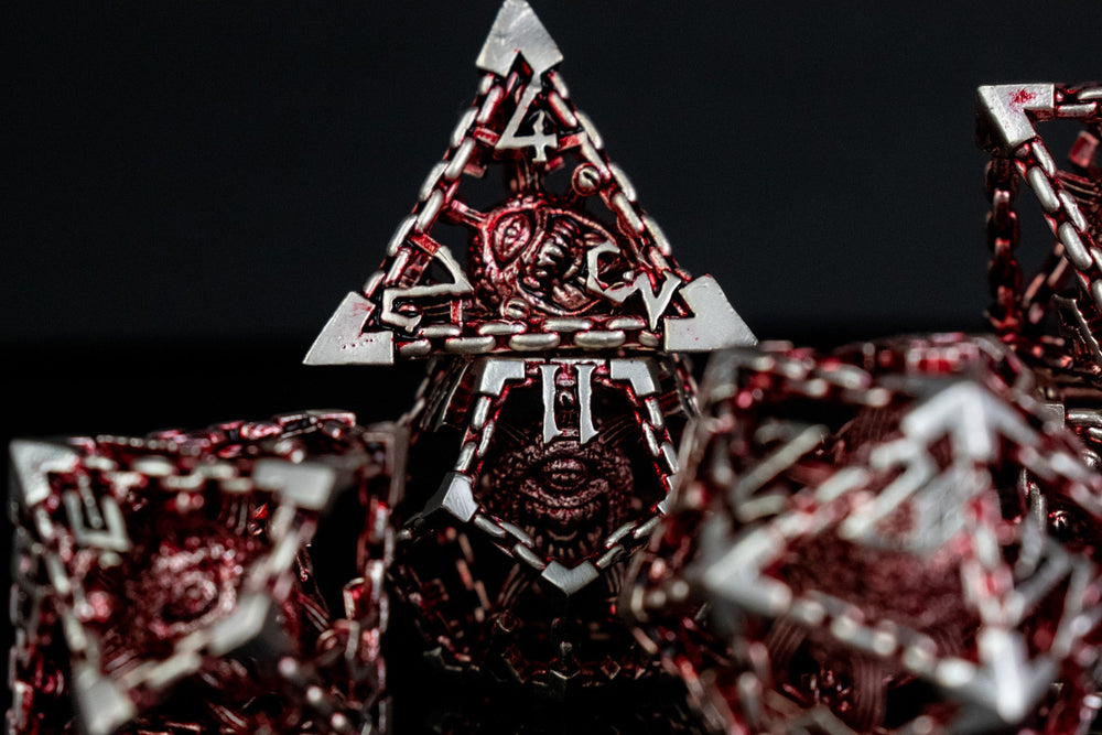 Beholder's Gates Hollow Metal Dice Set - Red and Silver (ONLINE ORDER ONLY)
