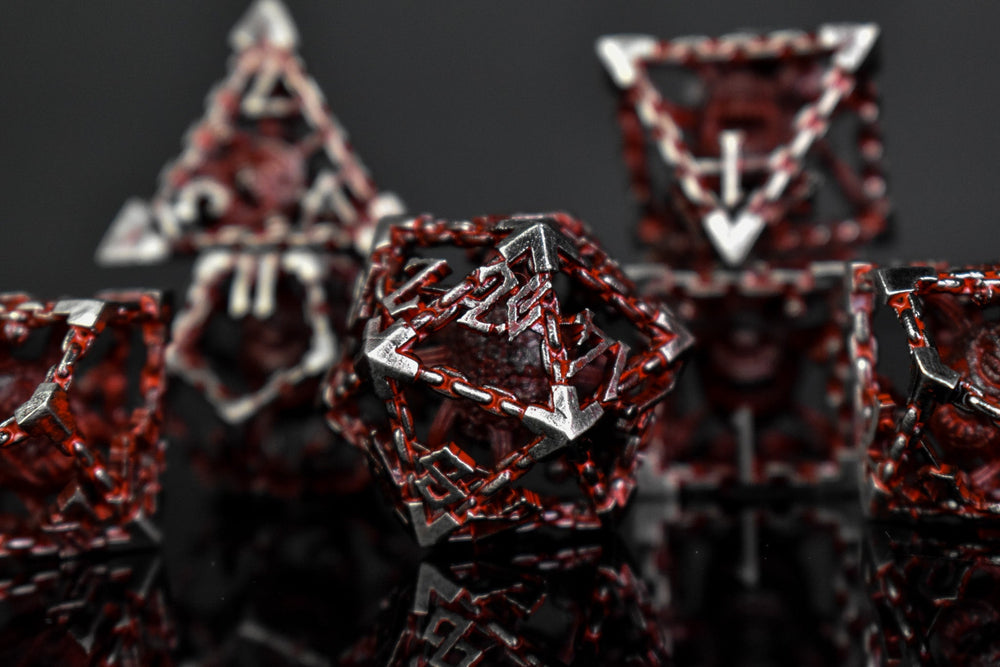 Beholder's Gates Hollow Metal Dice Set - Bloodied Silver (ONLINE ORDER ONLY)