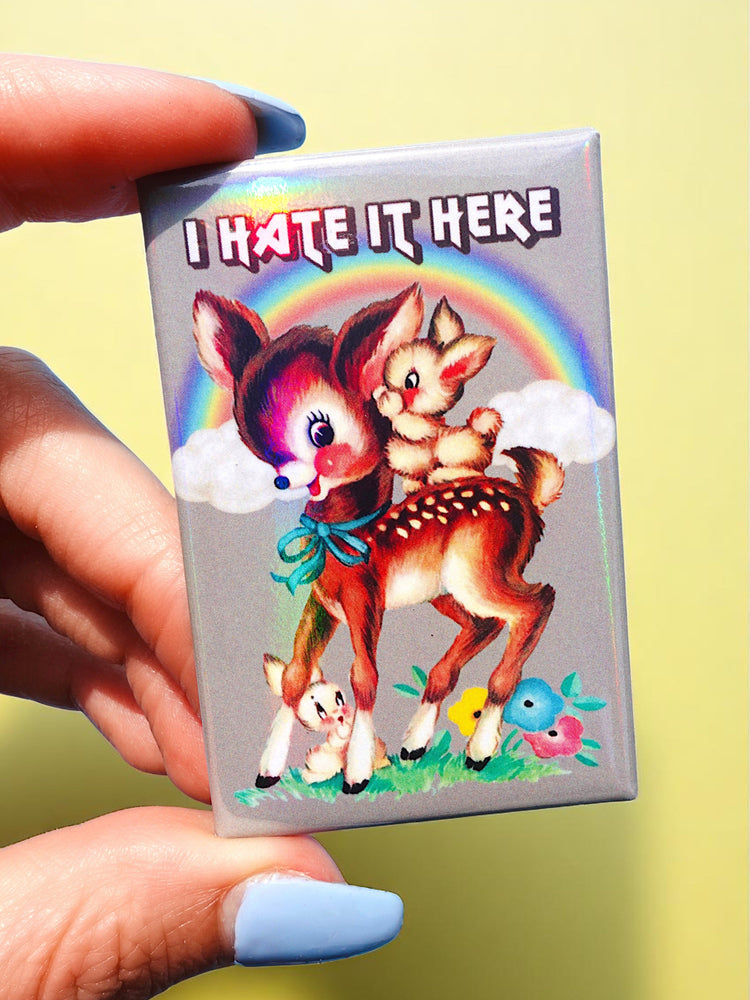 I Hate It Here Holographic Pin – Retro Rainbow Deer with Dark Humor (Online Order Only)