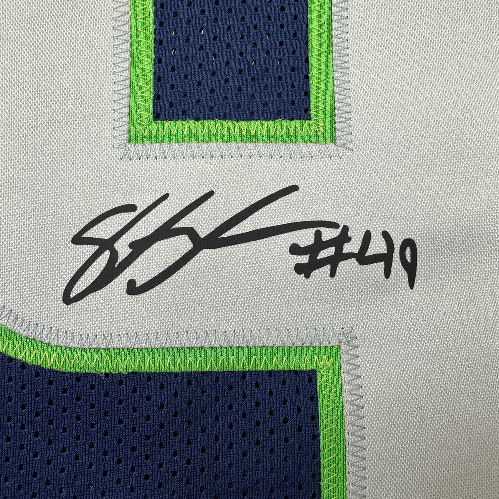 Framed Facsimile Autographed Shaquem Griffin 35x39 Seattle Blue Reprint Laser Auto Football Jersey (ONLINE ORDER ONLY)