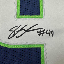 Framed Facsimile Autographed Shaquem Griffin 35x39 Seattle Blue Reprint Laser Auto Football Jersey (ONLINE ORDER ONLY)