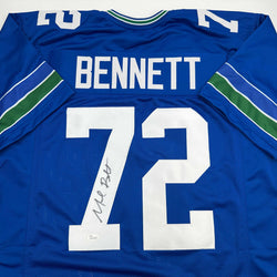 Autographed/Signed Michael Bennett Seattle Blue Retro Football Jersey JSA COA (ONLINE ORDER ONLY)