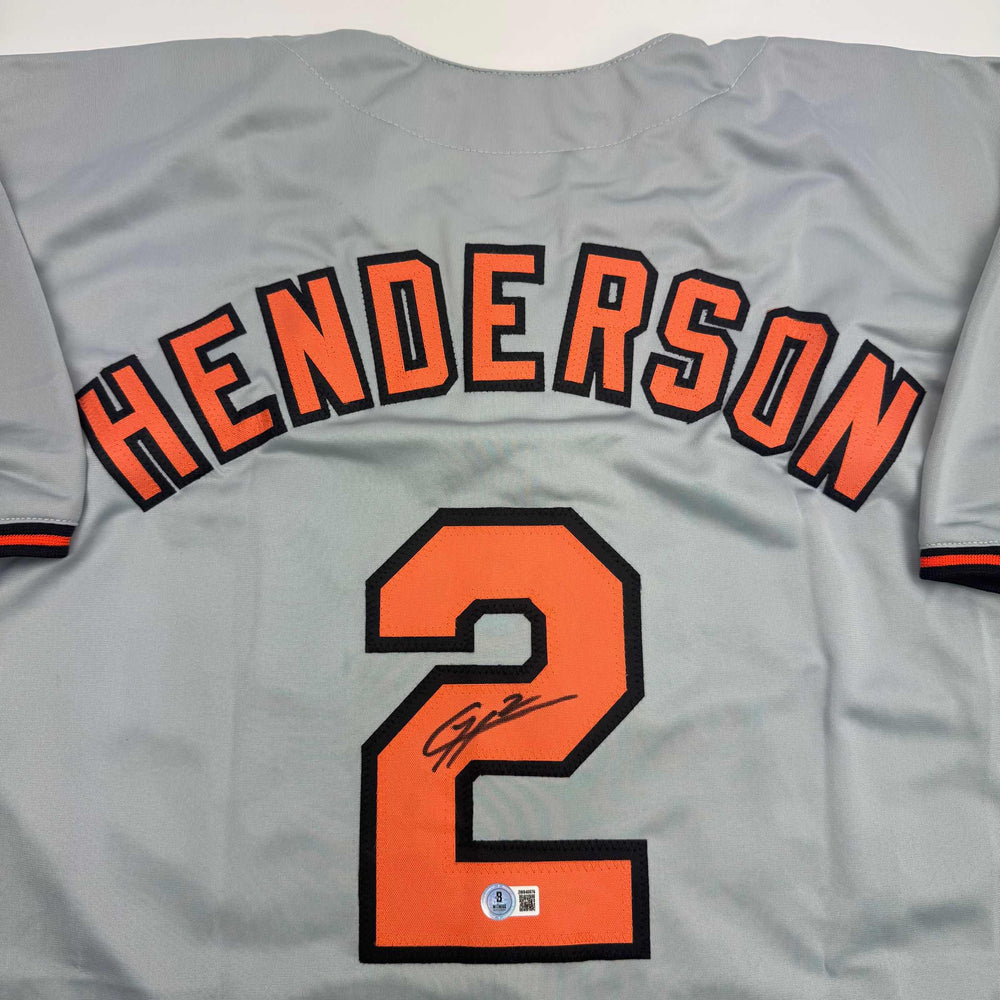 Autographed/Signed Gunnar Henderson Baltimore Grey Baseball Jersey Beckett BAS COA (ONLINE ORDER ONLY)