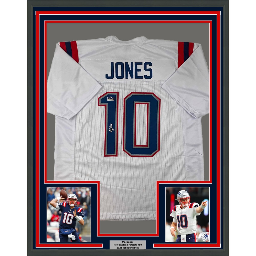 Framed Facsimile Autographed Mac Jones 35x39 New England White Reprint Laser Auto Football Jersey (ONLINE ORDER ONLY)