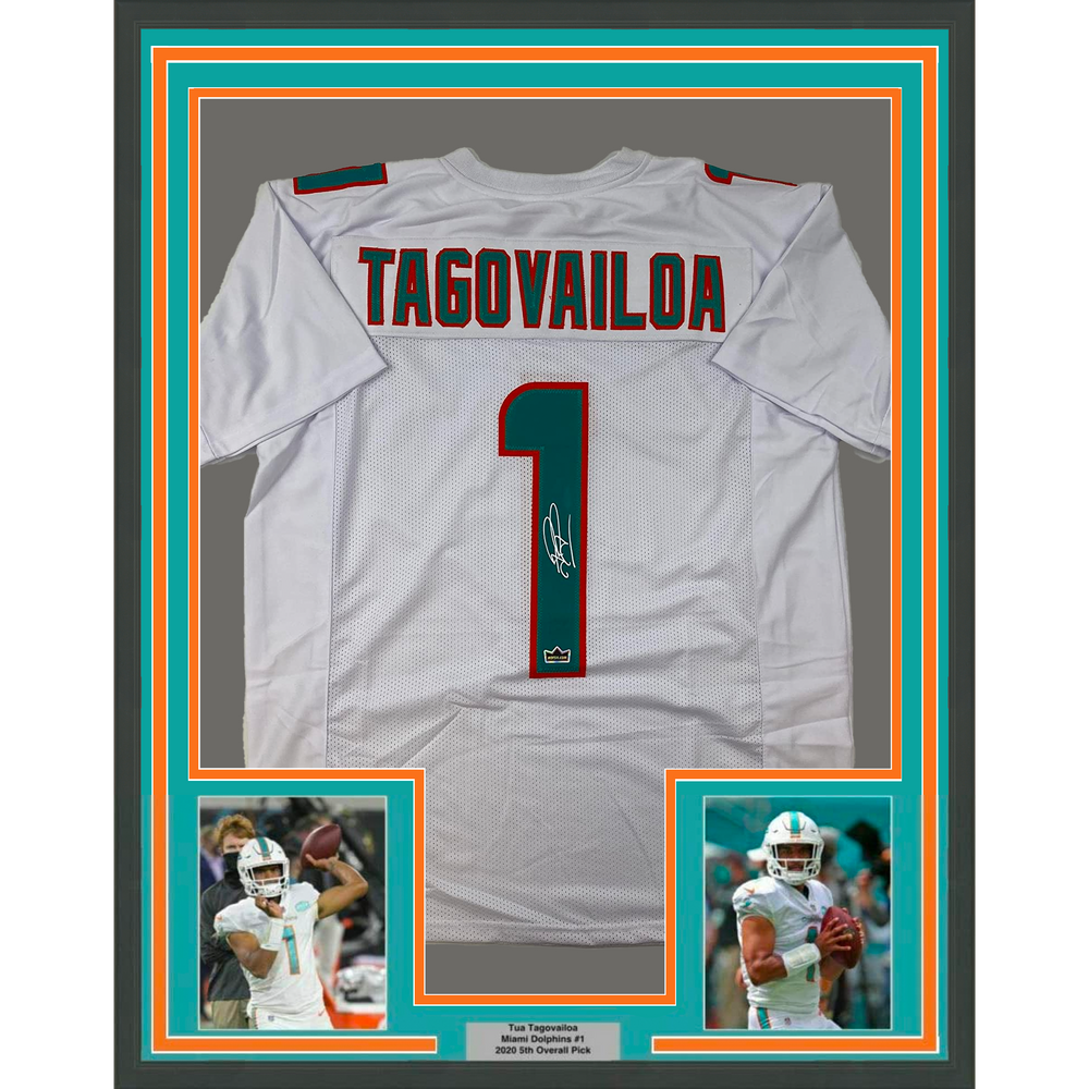 Framed Facsimile Autographed Tua Tagovailoa 35x39 Miami White Reprint Laser Auto Football Jersey (ONLINE ORDER ONLY)