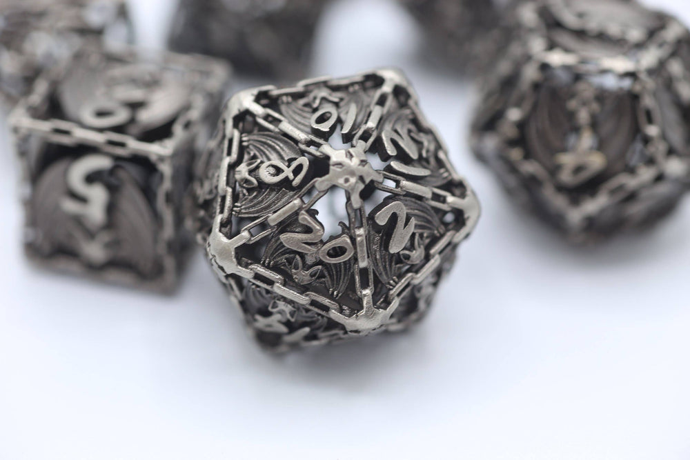 Ancient Silver Hollow Metal Bat Polyhedral Dice Set (ONLINE ORDER ONLY)