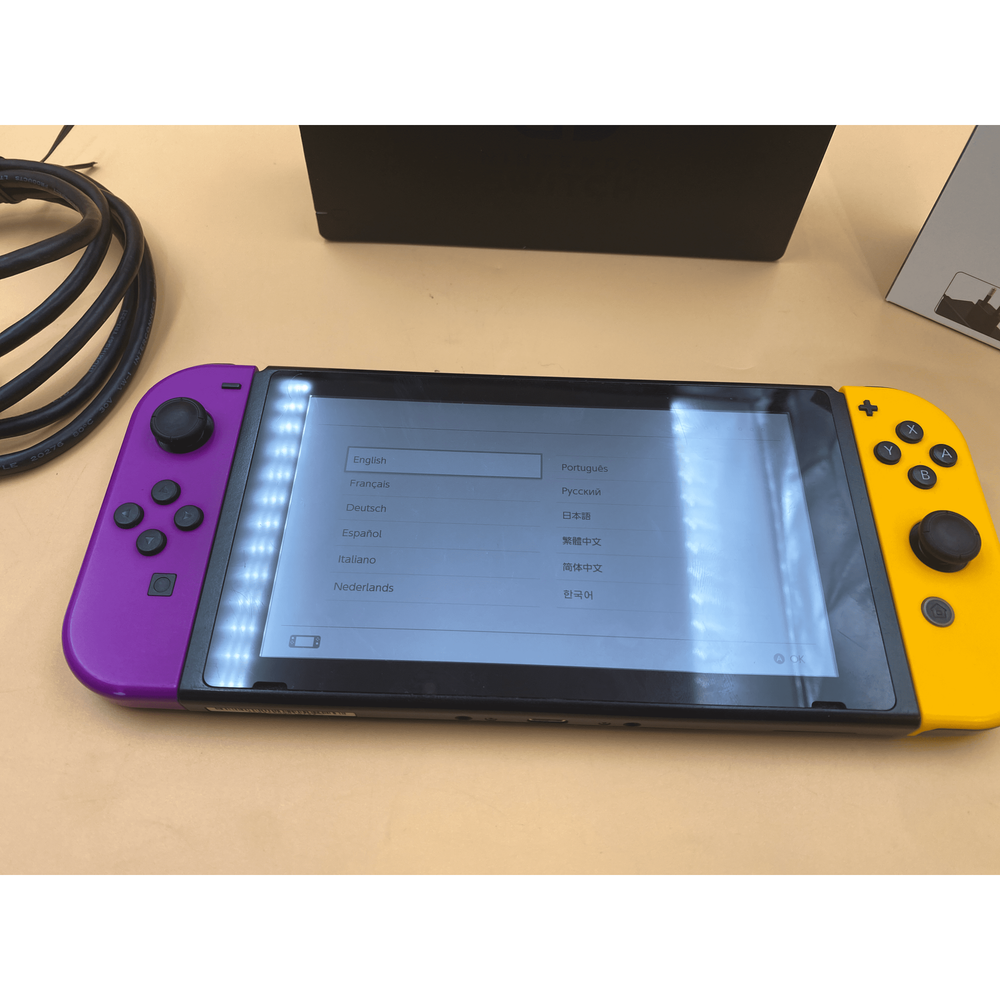 Nintendo Switch With Purple And Yellow Joy-Con (Online Order Only)