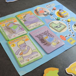 Millennial Manatees: Board Game in a Fanatee Pack (ONLINE ORDER ONLY)