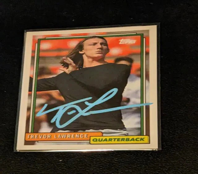 A Trevor Lawrence autographed card w/ COA (Online Order Only)