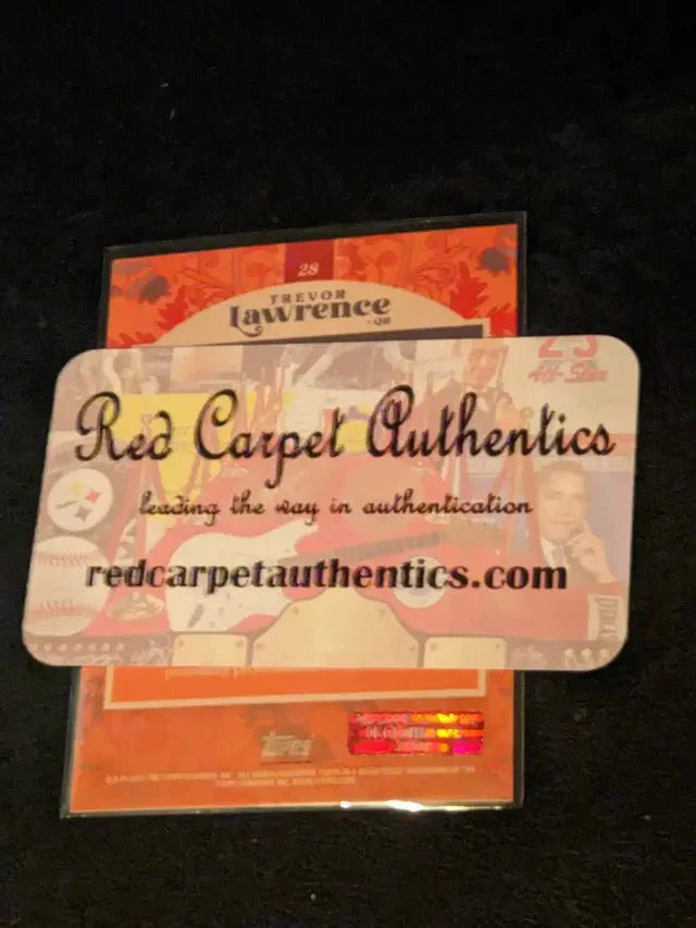 A Trevor Lawrence autographed card w/ COA (Online Order Only)